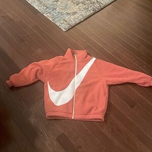 Nike reversible jacket. It’s a men’s but more like unisex.